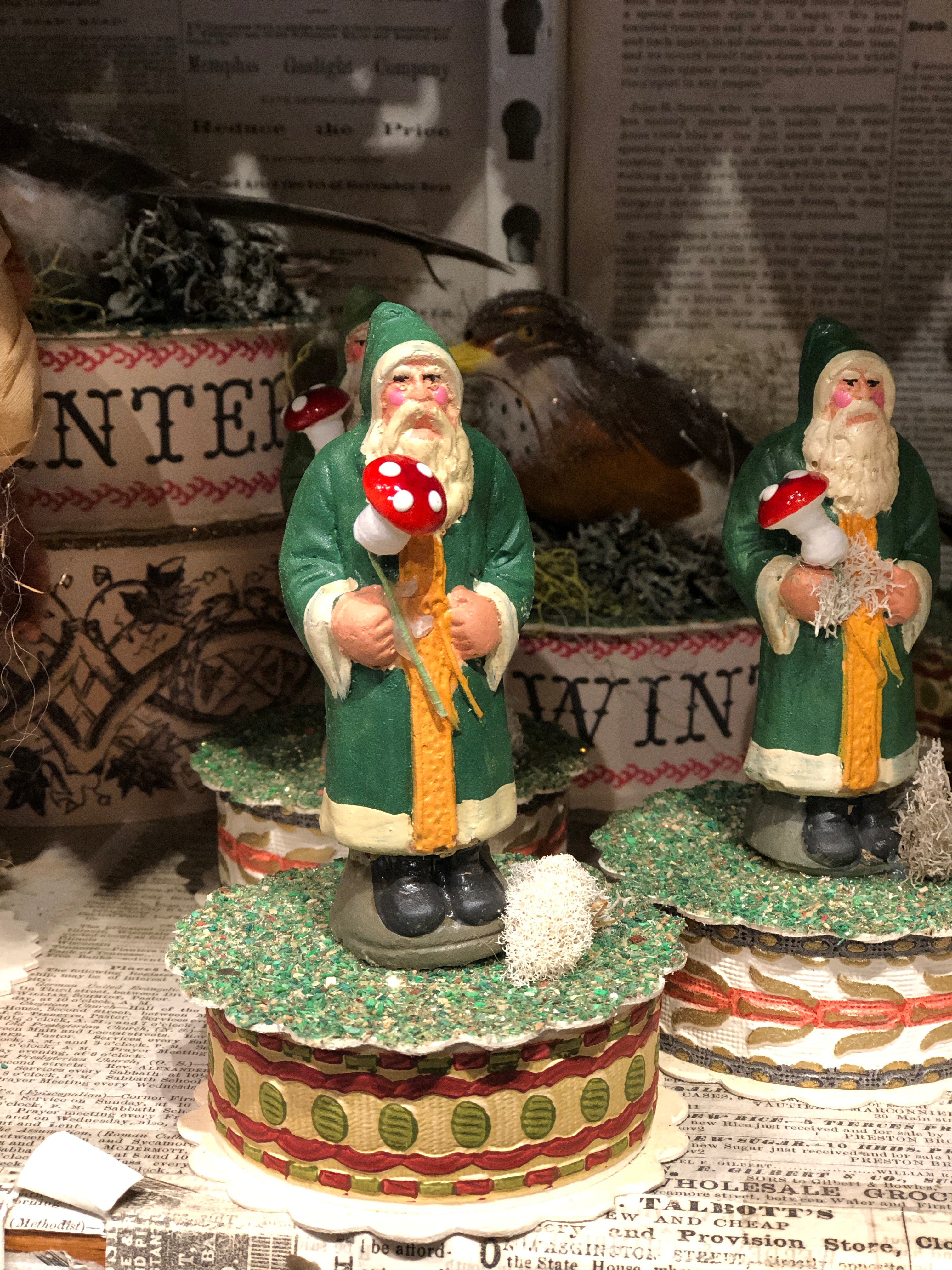 Hand Cast and Painted Santa on Tiny Gift Box