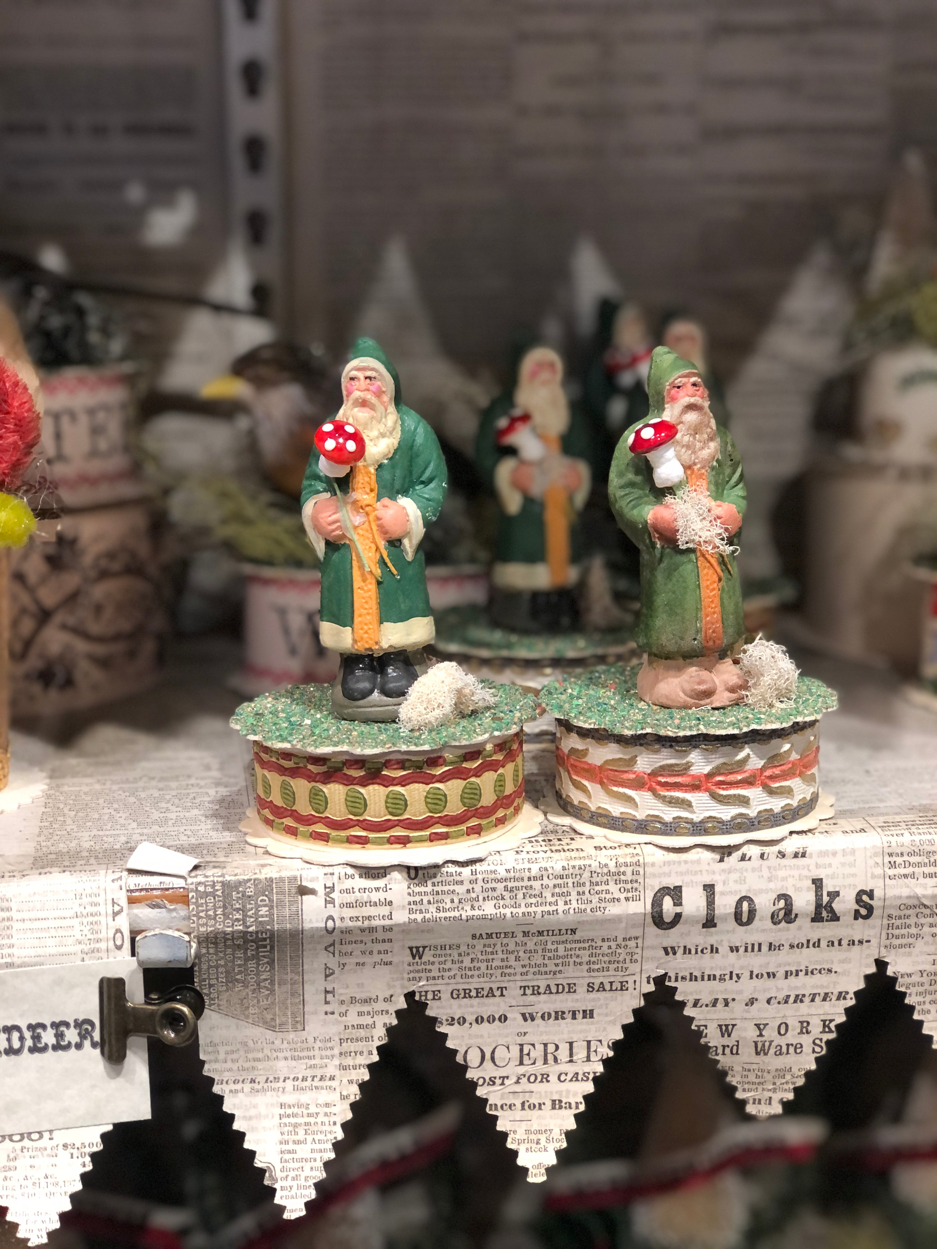 Hand Cast and Painted Santa on Tiny Gift Box