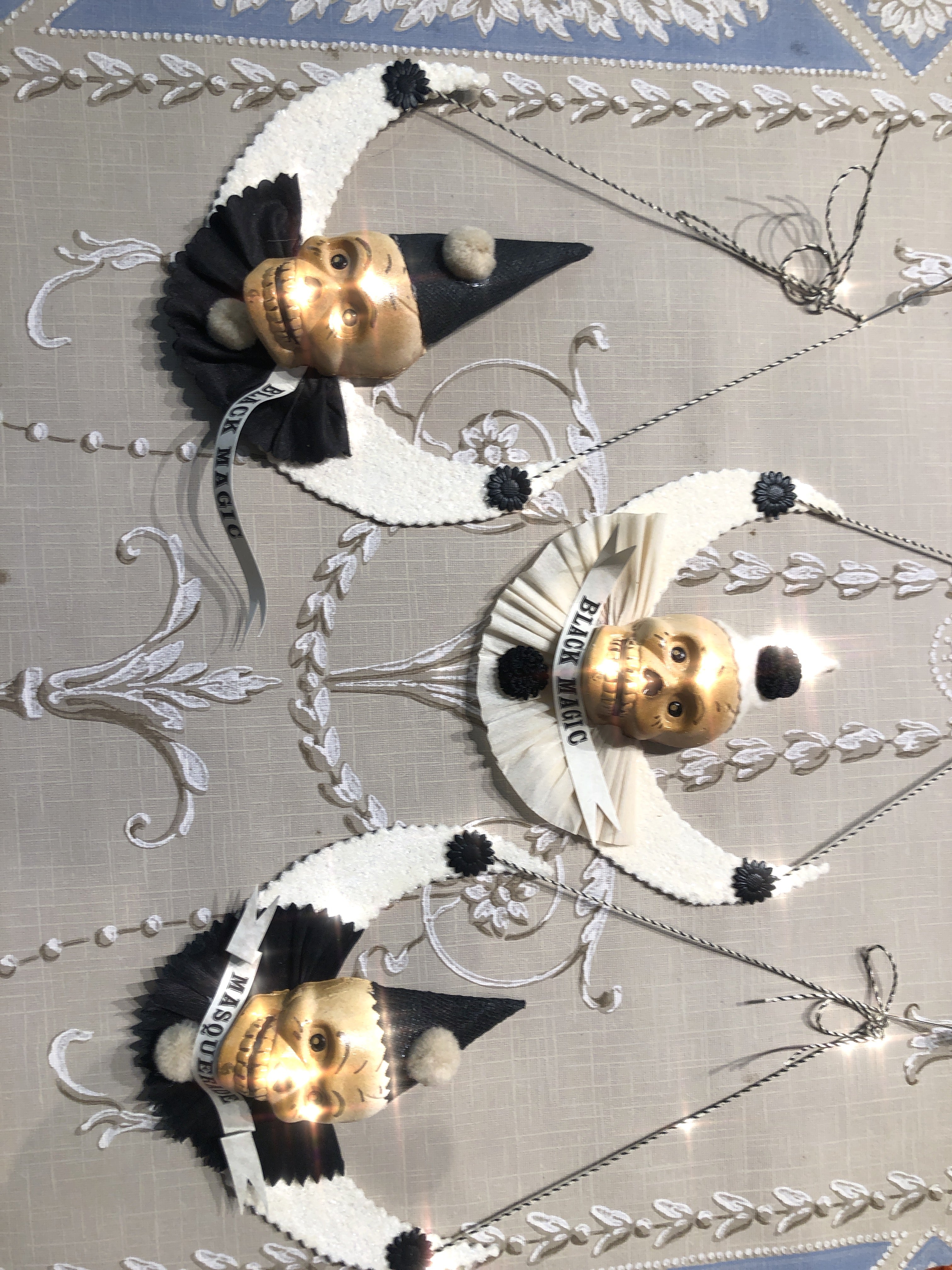 Masquerade Skulls on a White Moon