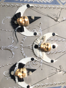 Masquerade Skulls on a White Moon