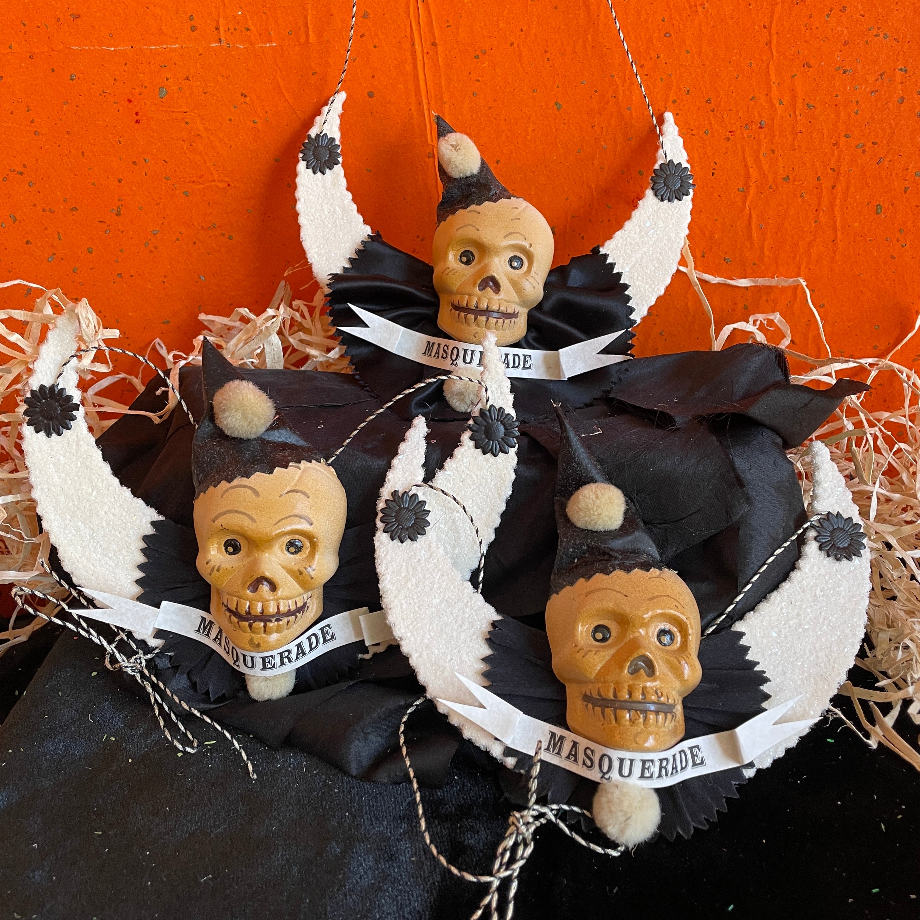 Masquerade Skulls on a White Moon